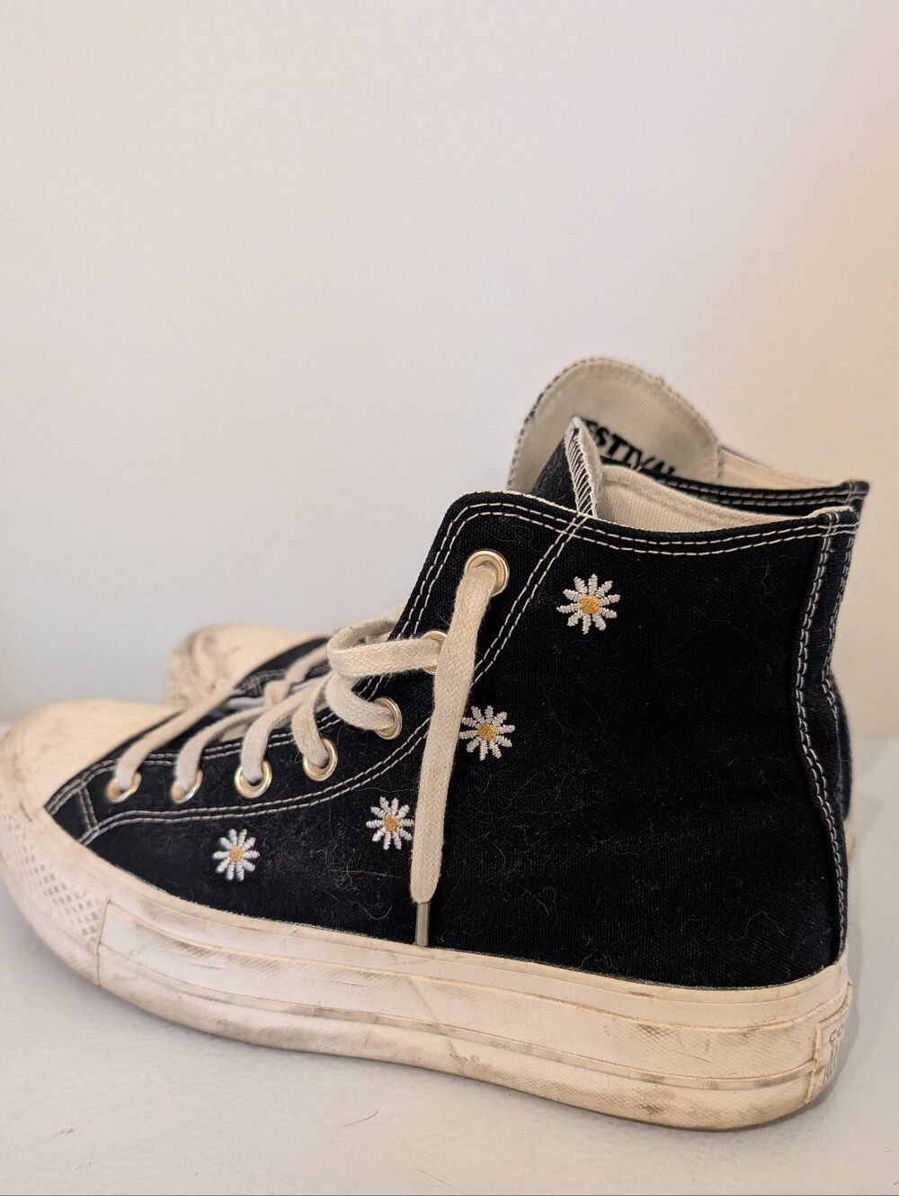 Converse Black Canvas High-Top Sneakers with White Daisies